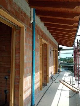 Wall with systems and frames prepared for the external coat Stock Photos