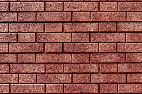 Wall texture and brown block pattern old, are suitable for a simple design ba Stock Photos