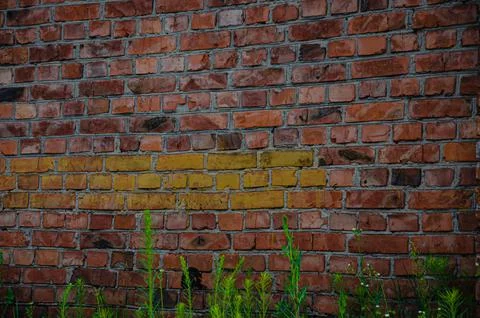Wall texture and red block pattern are suitable for a simple design backgroun Stock Photos