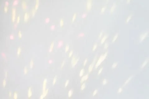 Wall texture with diagonal shadow and rays of light Stock Photos