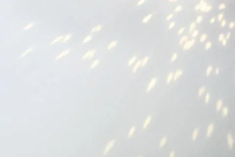 Wall texture with diagonal shadow and rays of light Stock Photos