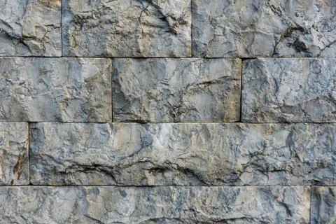 Wall texture. Gray rectangular stones. Horizontal and vertical lines. Texture Stock Photos