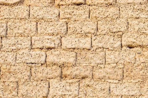Wall texture of old adobe bricks Stock Photos