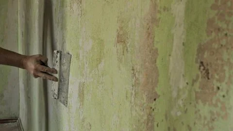 Wall texture in the process of scraping Stock Photos