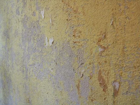 Wall texture with scraped wallpaper Stock Photos