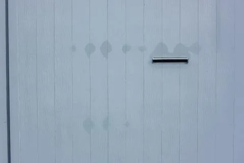 Wall texture white hole door Stock Photos