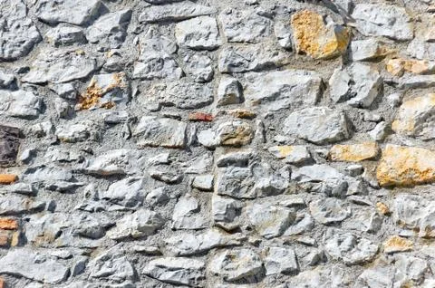 Wall with textured bricks Stock Photos