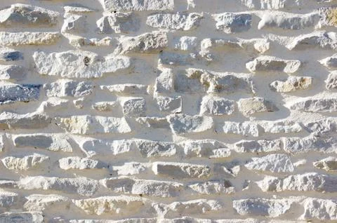 Wall with textured bricks Stock Photos