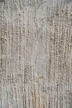 A wall with a textured surface 스톡 사진