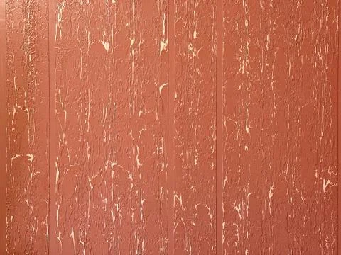 A wall with a textured surface. The wall is tan in color. The texture is rough Foto stock
