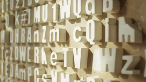 Wall with three-dimensional letters and symbols on it Stock Footage 271626843