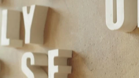 Wall with three-dimensional letters and symbols on it Stock Footage 271626864