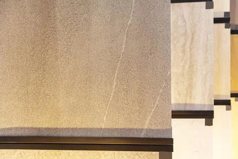 Wall tile materials in tile shops are arranged in various patterns. Stock Photos