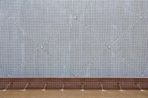 A wall with tiles as background Stock Photos