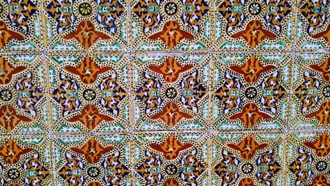Wall of Traditional Multi-Colored Azulejo Tiles with Complex Geometric Patter Stock Photos