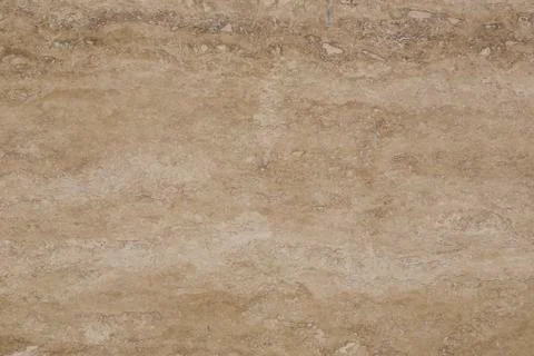 Wall of travertine with stone layers of different colors.  Stock Photos