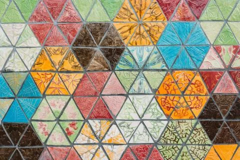 Wall of triangular colorful textured tiles Foto stock