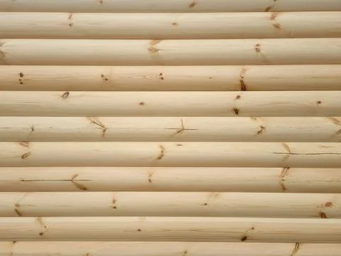 Wall of unpainted logs Stock Photos