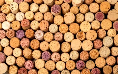 Wall of used wine corks. Stock Photos