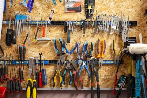 Wall with various tools in the garage Stock Photos