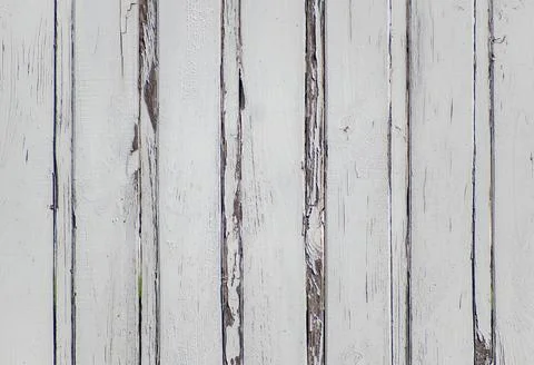 Wall of vertically stacked planks white cracked color Stock Photos