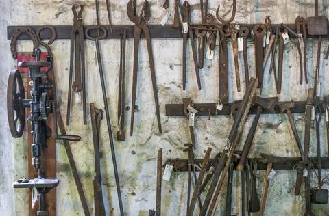 Wall of vintage blacksmith tools Stock Photos
