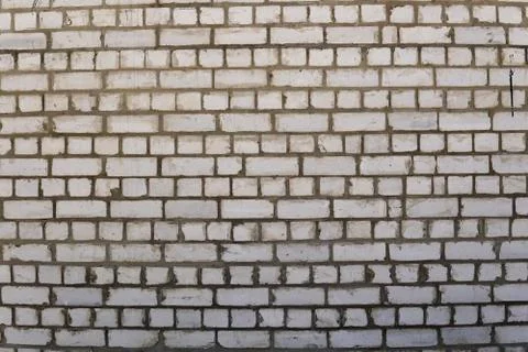 Wall of white old brick. Backgrounds, texture Stock Photos