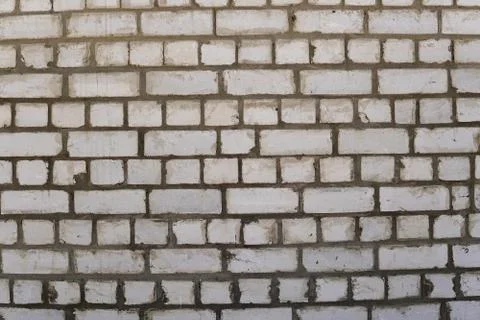 Wall of white old brick. Backgrounds, texture Stock Photos