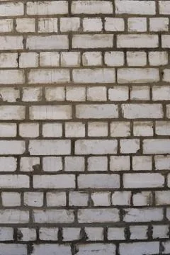Wall of white old brick. Backgrounds, texture Stock Photos