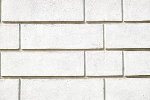 Wall with white stone slabs Stock Photos