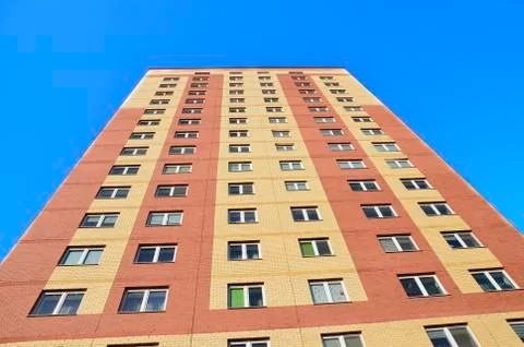 A wall with Windows of a new modern multi storey residential building a House Stock Photos