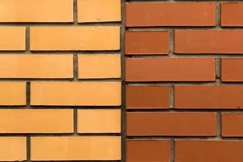 Wall of Yellow and Red Bricks Stock Photos