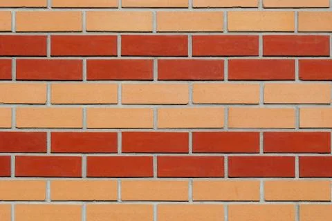Wall of yellow-red brick. Stock Photos