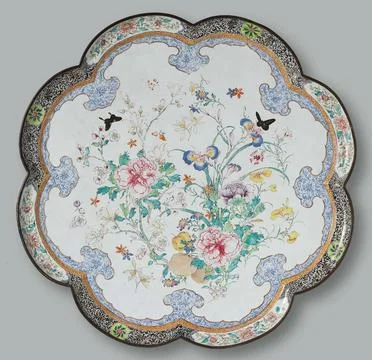 . Walled dish, painted in flat with large flower branches that are largely... Stock Photos
