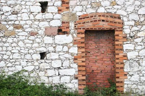 Walled old door Stock Photos