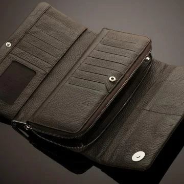 Wallet on a black background Stock Photos