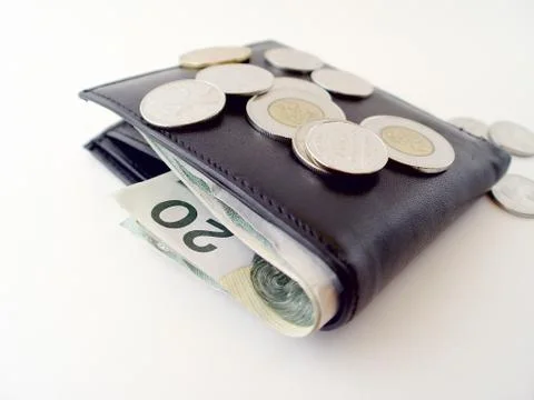Wallet with coins Stock Photos