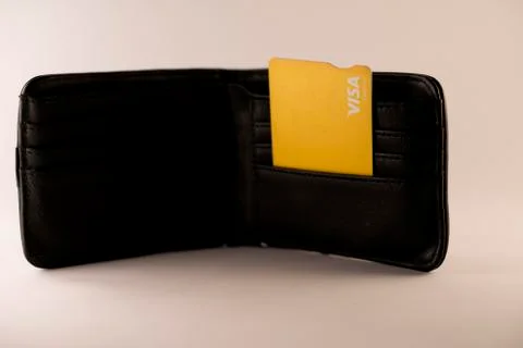 Wallet with a debit card . Stock Photos
