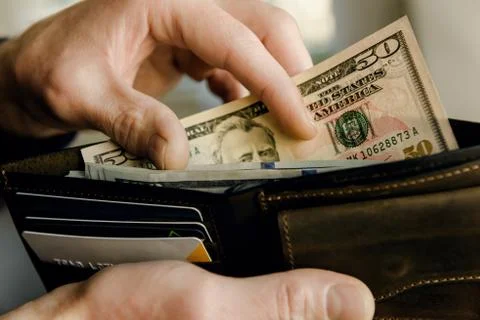 The wallet with dollars. Stock Photos