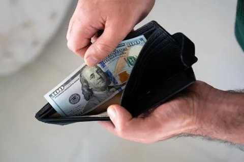 Wallet full of dollar bills Stock Photos