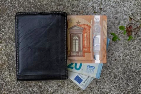 A wallet lying on the floor. Stock Photos