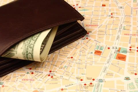 Wallet on map Stock Photos