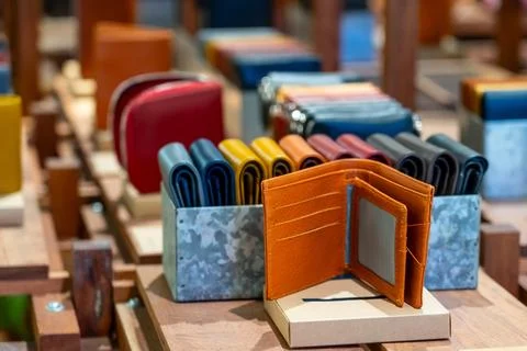 Wallet, purse on a table in a store window for sale Foto stock