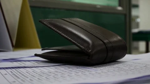 Wallet on the table Stock Footage 78631567