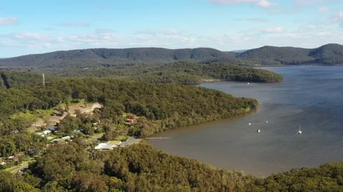 Wallis lake aerial hovering to Pacific ocean Elizabeth bay in Booti Booti NP 4k. Stock Footage 200426238