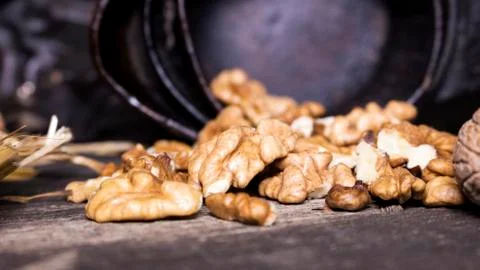 Wallnuts and hand walnuts grinder Stock Photos