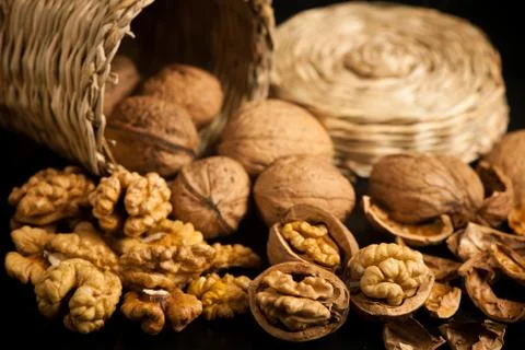 Wallnuts on a table in small baskets Stock Photos