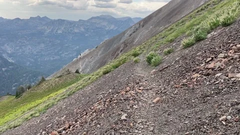 Wallowas Eagle Cap Wilderness: descending from a pass Stock Footage 329454946