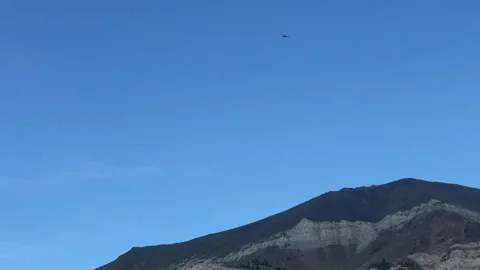 Wallowas Eagle Cap Wilderness: helicopter flies overhead Stock Footage 329454965
