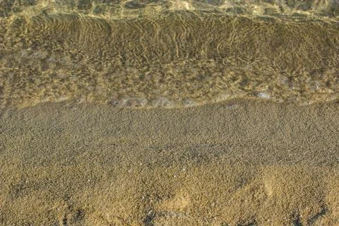Wallpaper background pattern concept picture of beach coast line sand and wat Stock Photos